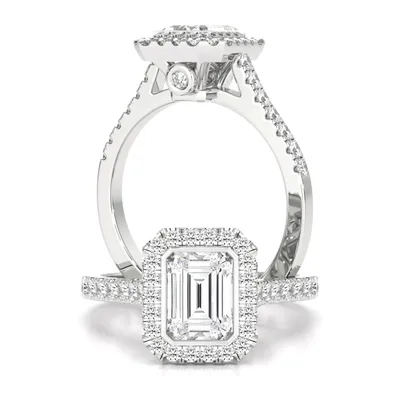 A stunning lab grown emerald cut diamond halo with shoulder stones set in platinum