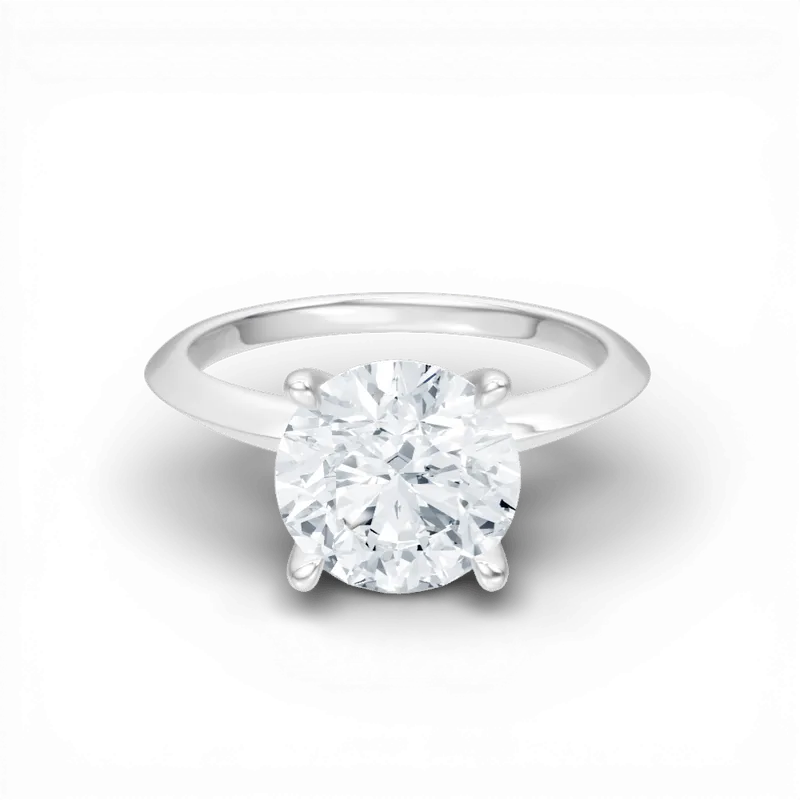 The Teya Round Cut 14kt White Gold Four-Prong Solitaire Engagement Ring